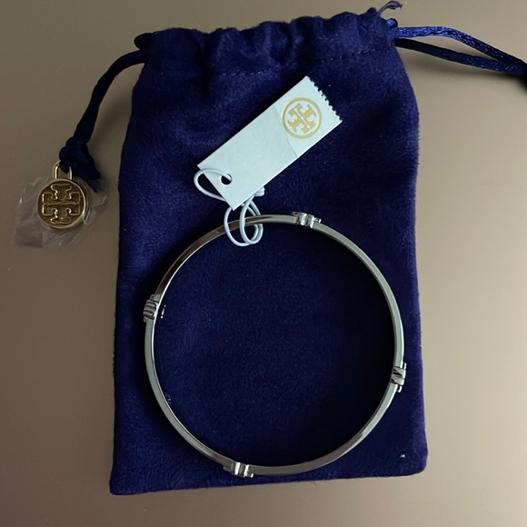 Tory Burch Jewelry - Tory Burch silver bangle with logo - new with tags never worn